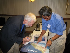 FSEC solar energy researcher, Bill Young, talks with one of the workshop attendees in Aruba. During his stay, Young also visited a local school to give a presentation on solar and renewable energy. 