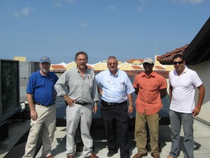 From left: FSEC researchers Bill Young and John Harrison, Facilities Manager of the Bucuti Hotel and Resort, FSEC researcher Patrick Robinson, and local PV entrepreneur Robert Mc David.