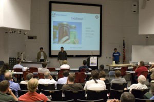 Attendees view a presentation.