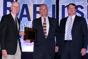 Charles Cromer, center, was selected=