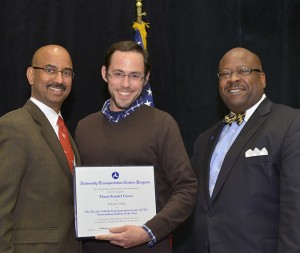 Photo of Thron Crowe holding certificate