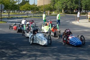 Photo of go-cart type electric vehicles ready to race at FSEC as part of EnergyWhiz.